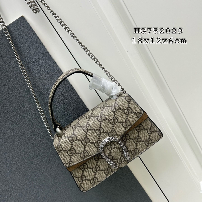 G*u*i top handle bags